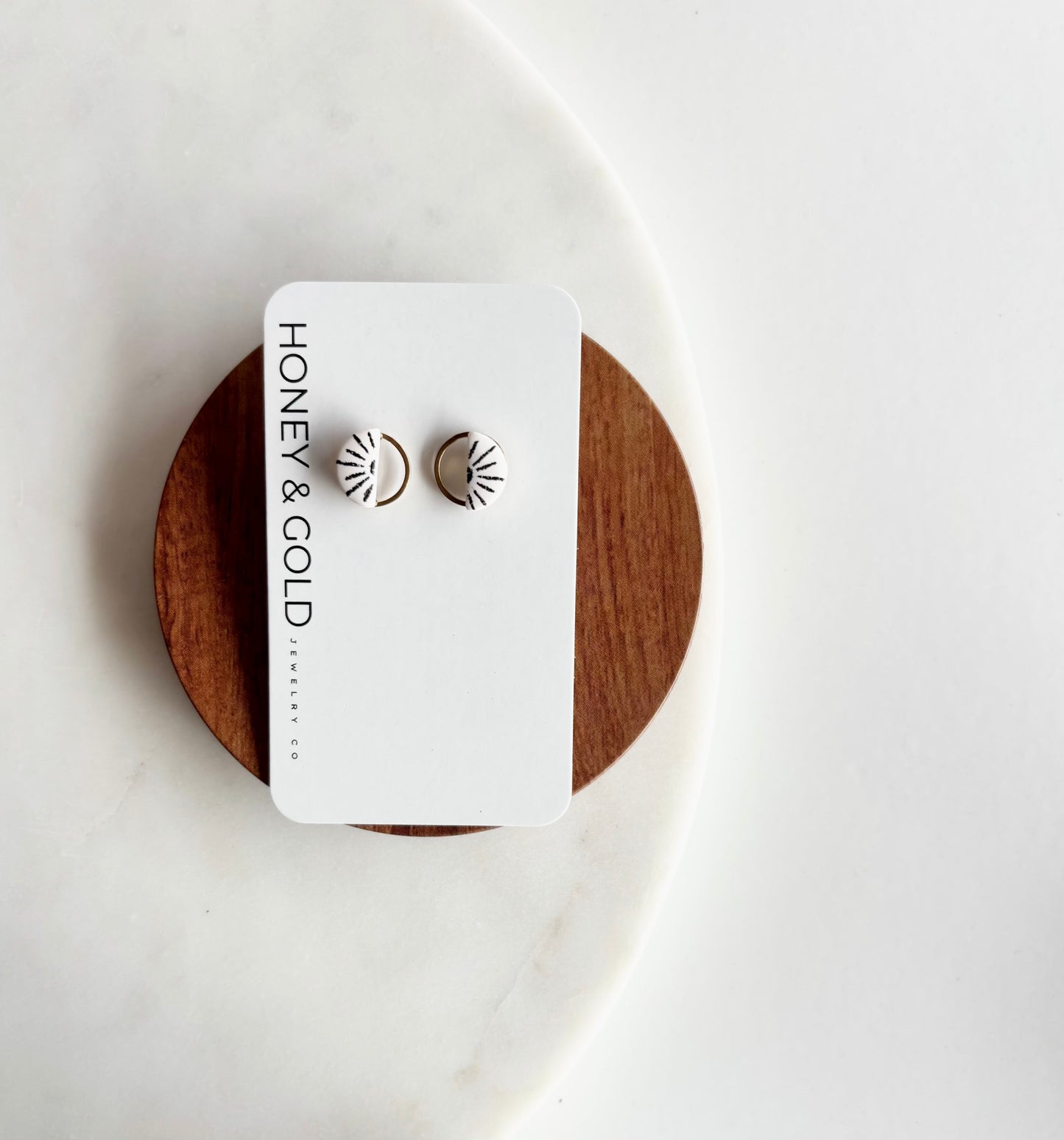 HALO: Gold-Toned Circle Stud Earrings with Sunshine Motiff