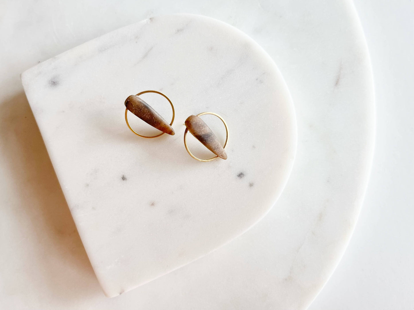 STILETTO HALO: Gold-Tone Circle Dagger Stud Earrings