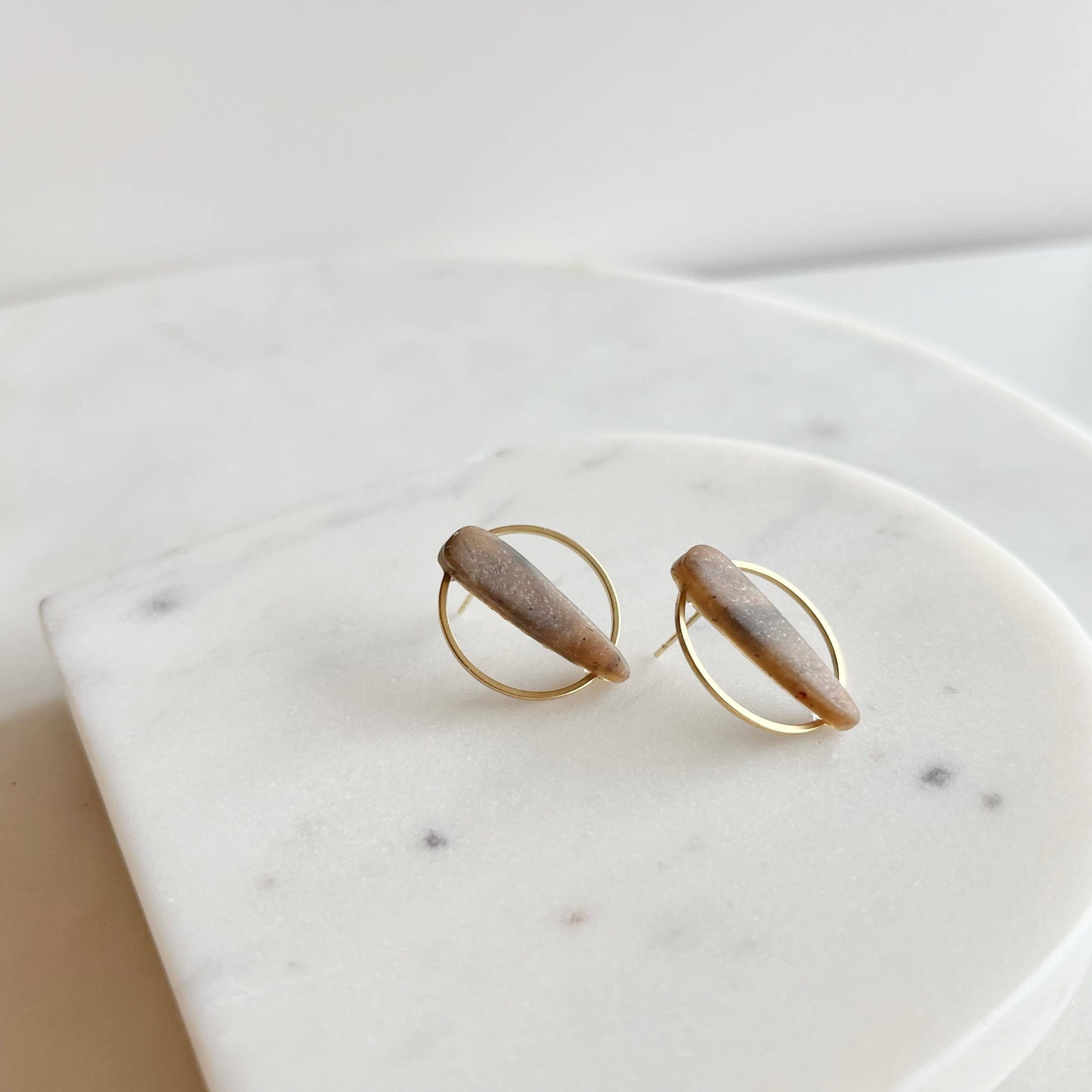 STILETTO HALO: Gold-Tone Circle Dagger Stud Earrings
