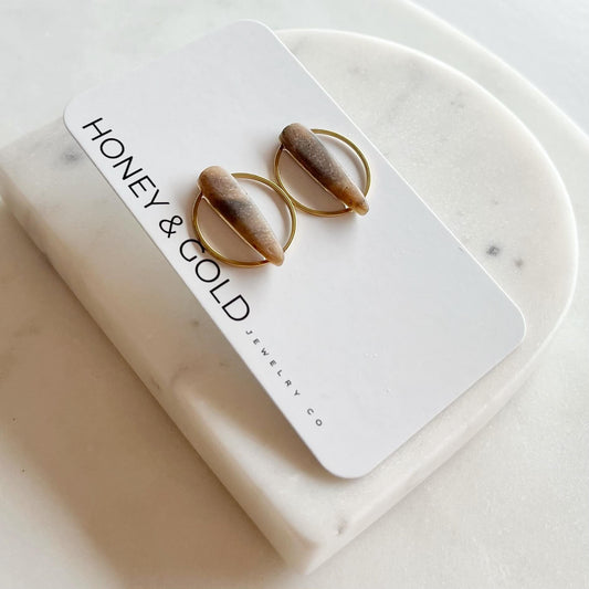 STILETTO HALO: Gold-Tone Circle Dagger Stud Earrings