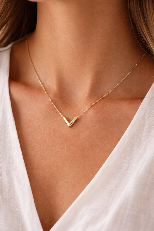 The V: Gold-Toned Necklace With Geometric V Pendant