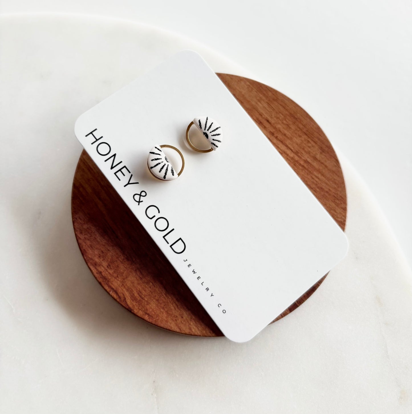 HALO: Gold-Toned Circle Stud Earrings with Sunshine Motiff