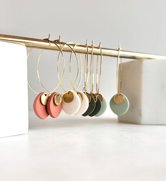 ODILLIA - Drop-style hoop earring.