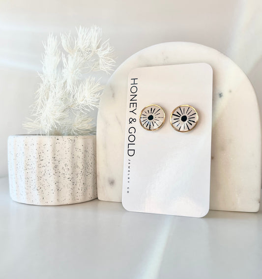 HALO: Gold-Tone Circle With Sun Motif Stud Earrings